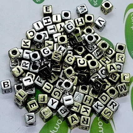 Dado plastico abs letras surt. x 100 gs