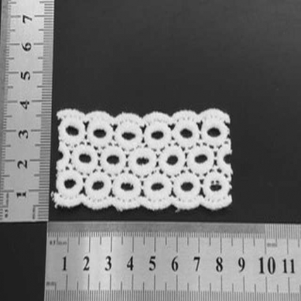 Guipure alg. 3.3cm blanco oval x 15 yd